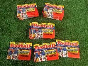 lot 115 image: 33 Sealed Packs 1988 Topps Football Yearbook Stickers