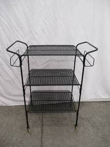 1950s-1960s Metal Magazine Rack on wheels