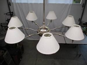 Silver colored 7 Light Chandelier with 7 fabric shades.