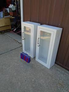 Qty of 2 glass front fire extinguisher cabintes or display boxes. As shown.