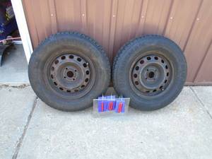 Qty of 2 14 2003 honda civic rims & tires. Good tread. As shown.
