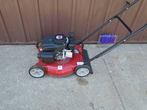 MTD push mower. Looks nearly new. Tested & works. As shown.