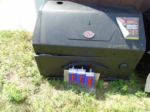 New Char Griller charcoal grill. Appears complete. Needs assembly. As shown.