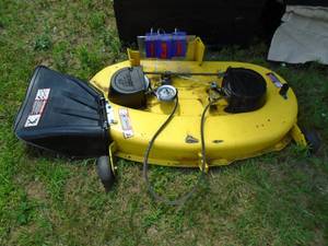 John Deere 120 42 mower deck with blades. Very nice condition. As shown.