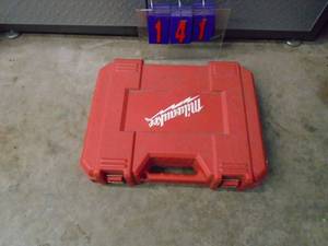 Milwaukee 14.4 volt drill with 2 batteries & charger in case. Tested & works. As shown.
