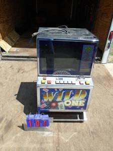 Wild one electronic poker machine. Appears complete. Has been sitting a few years. May need codes reset. As shown.