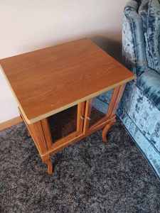 lot 5 image: Small 2-Door End Table with Storage, Top of Table is 19.25 inches wide by 15.75 inches deep, Table is 24 inches tall