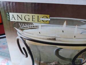 lot 51 image: San Angelo Glass Candle Holder with Package of Two Additional Floating Candles