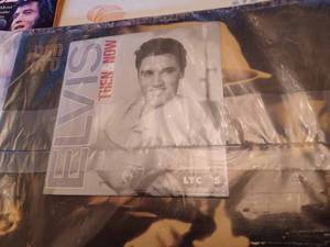 lot 63 image: Elvis Presley Collectibles 2002 Collectors Edition Catalog with Free C-D Inside Heartbreak Hotel and More