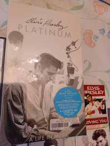 lot 67 image: Elvis Memorabilia 7 Unopened Cassettes, 2-Opened Cassettes, Elvis Presley Platinum 4-Cassette Set Unopened