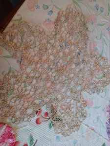 lot 108 image: Eight Hand-Made Doilies - Star Shaped Doily is said to be over 100 Years Old and is 19-inches across