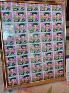 lot 109 image: Elvis Commemorative Postage Stamps Sheet of 40 Elvis 29 cent Postage Stamps in 8 X 10 Frame and an Elvis Mint Stamp Sheet