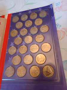 lot 112 image: 50 States Quarters with Paperback Booklet The 50 States