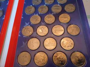 lot 122 image: 50 States Quarters with Paperback Booklet The 50 States