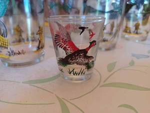 lot 126 image: Ornate 12 Piece Serving Set Pheasant Pitcher with 12 Glasses and One Shot Glass