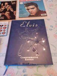lot 128 image: Hard Cover Book Elvis Commemorative Edition 2001 Copyright, USA Today Elvis Rocks On, USA Weekend-August 2002