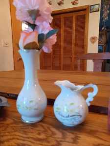 lot 150 image: Silver Anniversary Bud Vase and a Small PitcherCreamer, Saxony Wind-up Alarm Clock, Green Ash Tray, And Metal Cigar Ash