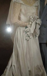 lot 161 image: Vintage Bridal Gown with Head Piece and Additional Material, Picture of the Wedding Day and Today to show the Style