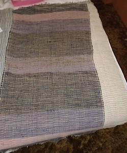 lot 173 image: Two 25-inch by 48-inch and One 22-inch by 48-inch Home Made Throw Rugs