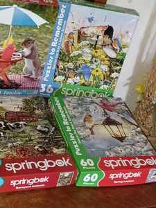 lot 176 image: Ten Jigsaw Puzzles - 3 are New Unopened, Two 300 pc., One 100 pc., Two 60 pc., Four 36 pc., and One 25 piece Puzzle