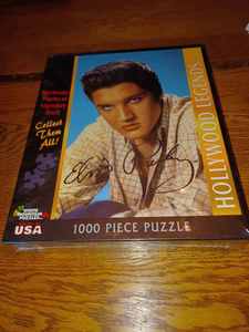 lot 178 image: 1000 Piece New Unopened Elvis Presley Puzzle and a Home-Made Elvis Wooden Bird House