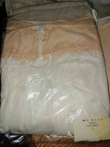 lot 194 image: Ladys Slips, Jobst Compression Stockings, Spandex Stockings, Misses Knee Highs, New Gauze Pads, and 2 New Boxes of Facial Tissue