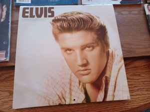 lot 206 image: Elvis 2017 - 16 Month Calendar, June 1990 Life Magazine, 1987 Newsweek Elvis, Elvis 68 Comeback Special on VHS and More