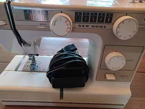 lot 214 image: New Home Model L-372 Portable Sewing Machine - Complete