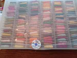 lot 217 image: Sewing Supplies New 500 Yards of Coats Dual Duty XP All Purpose Colored Thread, Assorted Plastic and Wooden Spools of Thread