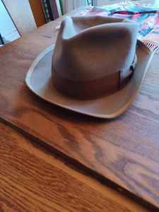 lot 221 image: Vintage Malrov Fine FurFelt Mens Hat, Vintage Pair of Suspenders, Pillow Cover -Grand Rapids, Minn. Souvenir Wolf and Trees Plaque