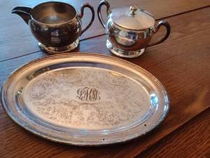 lot 222 image: Academy Silver on Copper Tray, Creamer, Sugar Bowl, Oneida Silver Plate Pedestal Dish, and a Pair of Salt & Pepper Shakers