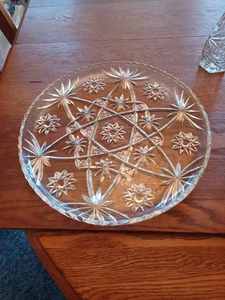 lot 238 image: Five Pieces of Pressed Glass - Matching or Real Close 13-inch Round Platter, 6-inch by 11-inch Celery, 7-inch Covered Dish, Cruet,
