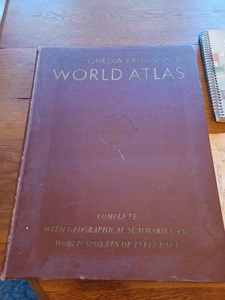 lot 244 image: Encyclopedia Britanica World Atlas 1944, Readers Digest Atlas of the World 1990, Ron Scharas Twin Cities Fishing Guide