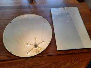 lot 262 image: Two Wall Mirrors 20-inch Round and a 14-inch by 22-inch Rectangular Mirror with Wires to Hang Vertically or Horizontally