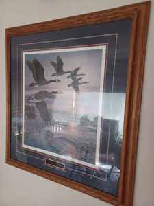 lot 278 image: One More Pass - Canadian Geese by James A. Meger 07, Signed, Framed and Matted Print, 25-inches by 27-inches