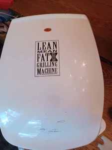 lot 307 image: George Foreman Lean Mean Fat Grilling Machine with Accessories and a Crock-Kellie Slow Cooker