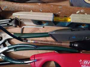 lot 325 image: New Craftsman Strap Wrench, S-K Channel Lock Pliers, Diamond Pliers, Vintage Wood Handled File, Evans 100-foot Tape