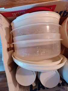 lot 336 image: Tupperware Salt & Pepper Shakers, 5 Storage Containers with Lids, 7 Plastic Coffee Cups, Tupperware Measuring Bowls