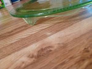 lot 345 image: 10-inch Green Depression Cake Plate and a 5-inch by 9-inch Glasbake Covered Casserole Dish
