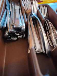 lot 348 image: Plastic Silverware Tray full of Assorted Stainless Steel and Flatware, Forks, Spoons, Butter Knives, and More