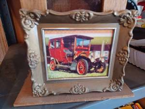 lot 390 image: Church Shaped Shadow Box with Plexiglass Front, 13-inches tall, an Old Car Picture7-inch by 6-inch, and a Wind Spinner