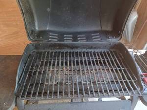 lot 396 image: Char-Broil Gas Grill with 20 lb. Tank, Grill Brush, Lighter, Meat Thermometer Fork, New Replacement Bar for Char-Broil