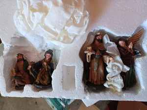 lot 397 image: 19-inch wide by 14-inch tall Stable and 12 Piece Polyresin Nativity Set, Standing Figures are 7.5-inches tall,