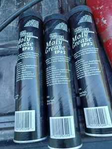 lot 430 image: Grease Gun with Three Full and One Partial Tube of New Grease