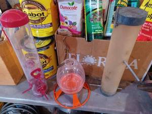 lot 472 image: Three Plastic Bird Feeders