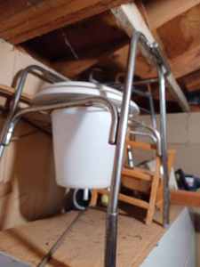 lot 486 image: Folding Aluminum Walker and a Portable Commode