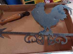 lot 534 image: Metal Rooster Metal Weather Vane, 22.5-inches wide by 10.5-inches tall, Hummingbird Wind Spinner, and a Wooden Horse