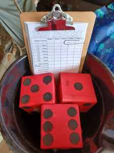 lot 535 image: Yard Yahtzee Game with Five Large Dice, Score Card, and Four Plastic Elves, 11-inches tall