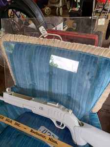 lot 536 image: Square Yard Stick from Rochester Silo, Inc., CTA Plastic Toy Gun 34-inches long, 26-inch Pair of Tree Pruners, and a Piece of