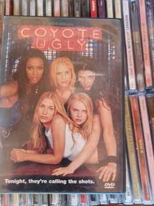 lot 539 image: Large Box of Music C-Ds, Loose C-Ds will Need to be Matched to the Cases, Country, Rock, and Rap, and One DVD Coyote Ugly